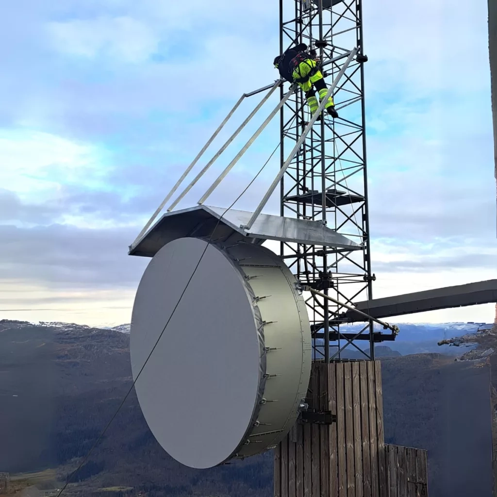 Installation of ice cover to protect large radio antenna